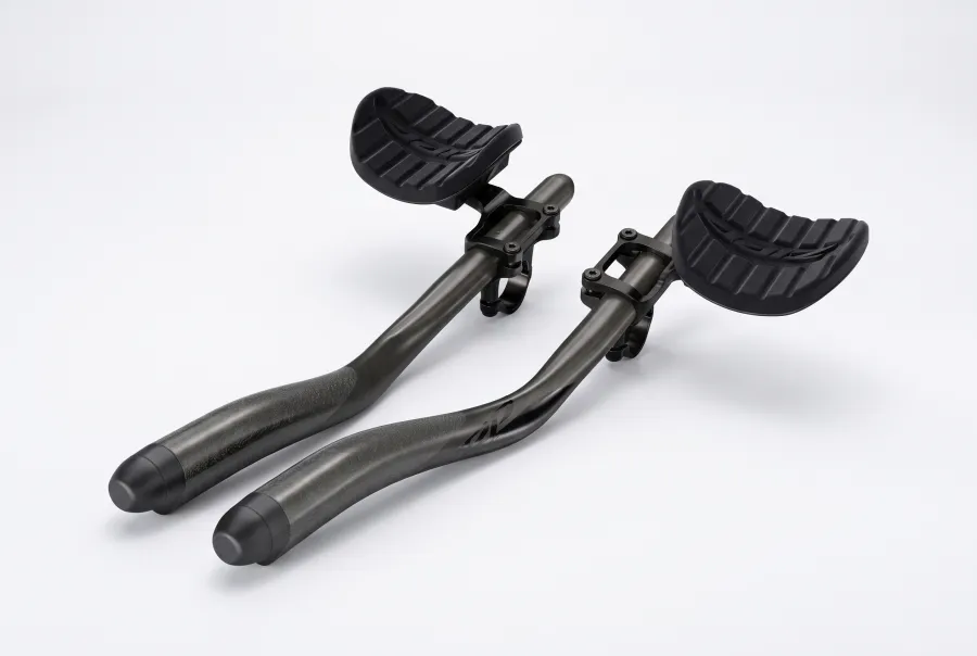 Zipp Vuka Clip carbon aerobar with Evo extensions and multi-radius bend, shown mounted with armrest pads on a white background