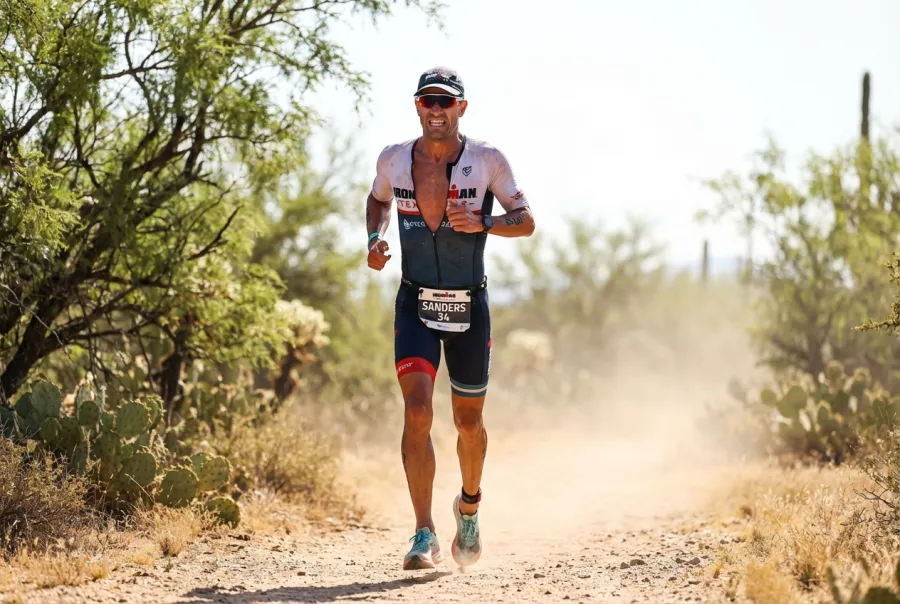Pro triathlete running hard on the Little Elm nature trail system during IRONMAN 70.3 Dallas