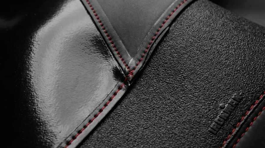 Orca wetsuit neoprene texture showing SCS coating and panel construction