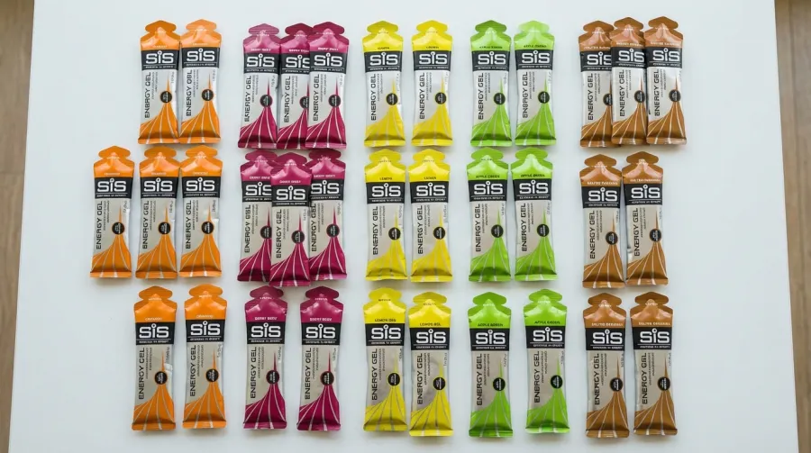 SIS GO isotonic energy gel sachets laid out for triathlon nutrition