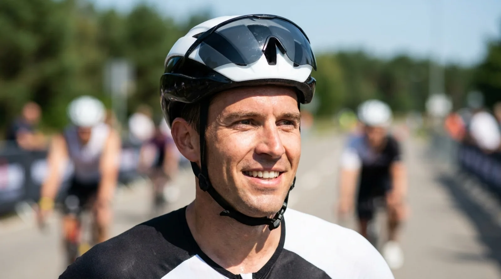 Triathlete wearing a modern aero helmet at a race